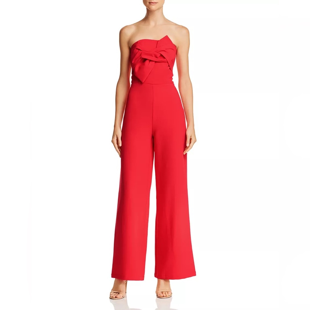 Do + Be red strapless jumpsuit with back cutout and bow